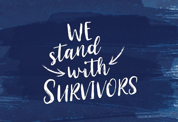 Blue background with white letters saying "we stand with survivors."